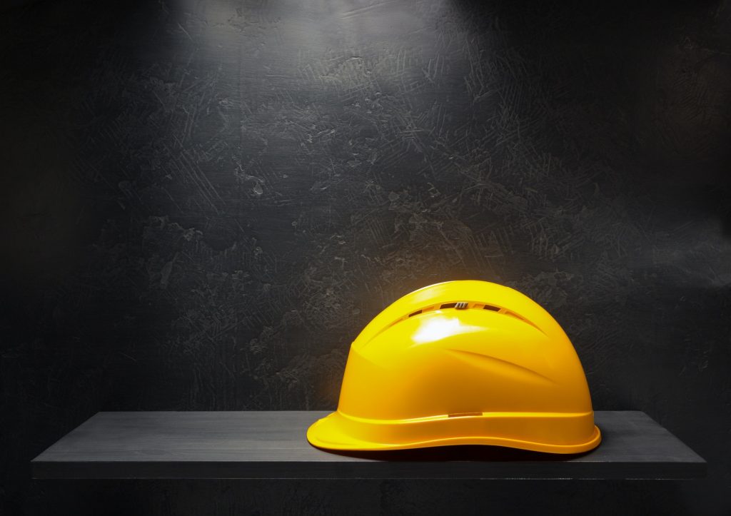 construction helmet on black